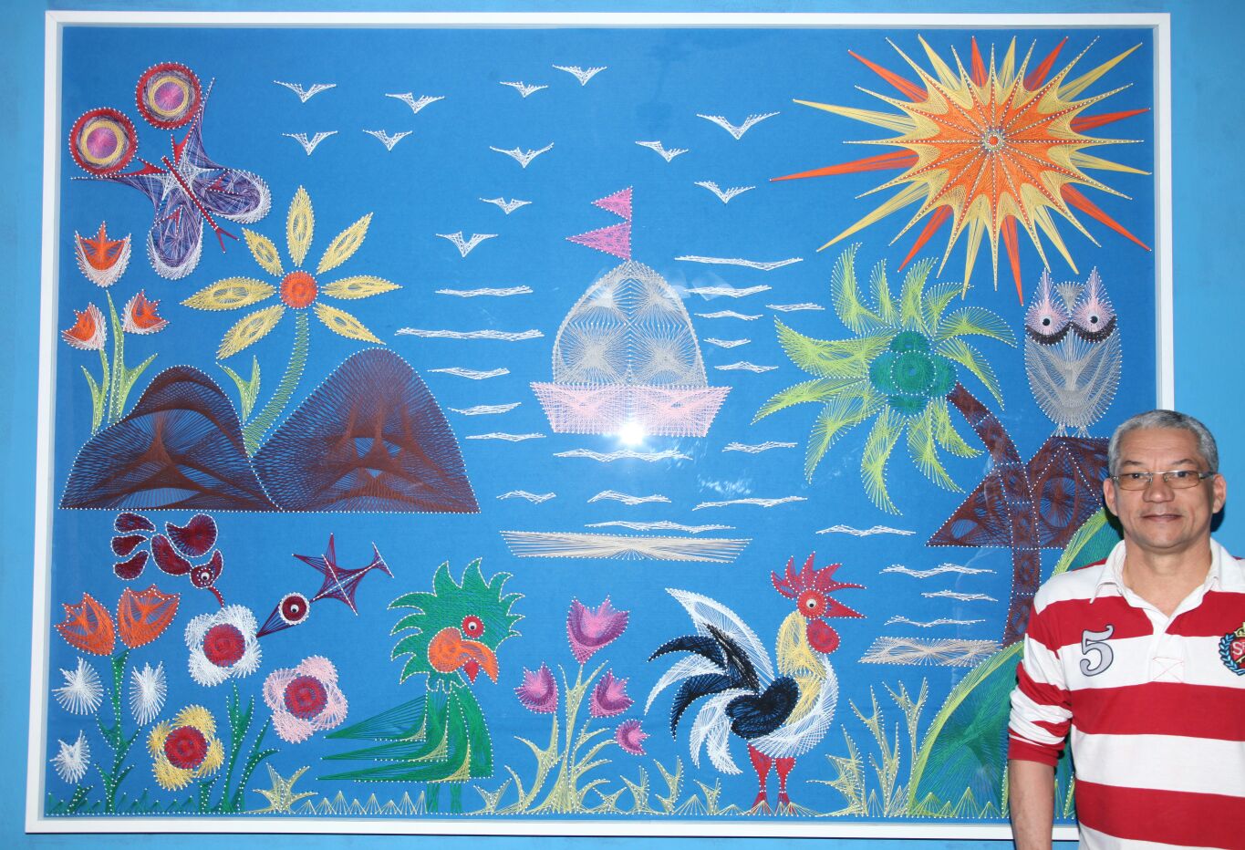 Artista faz quadro com mais de seis mil pregos e bate recorde